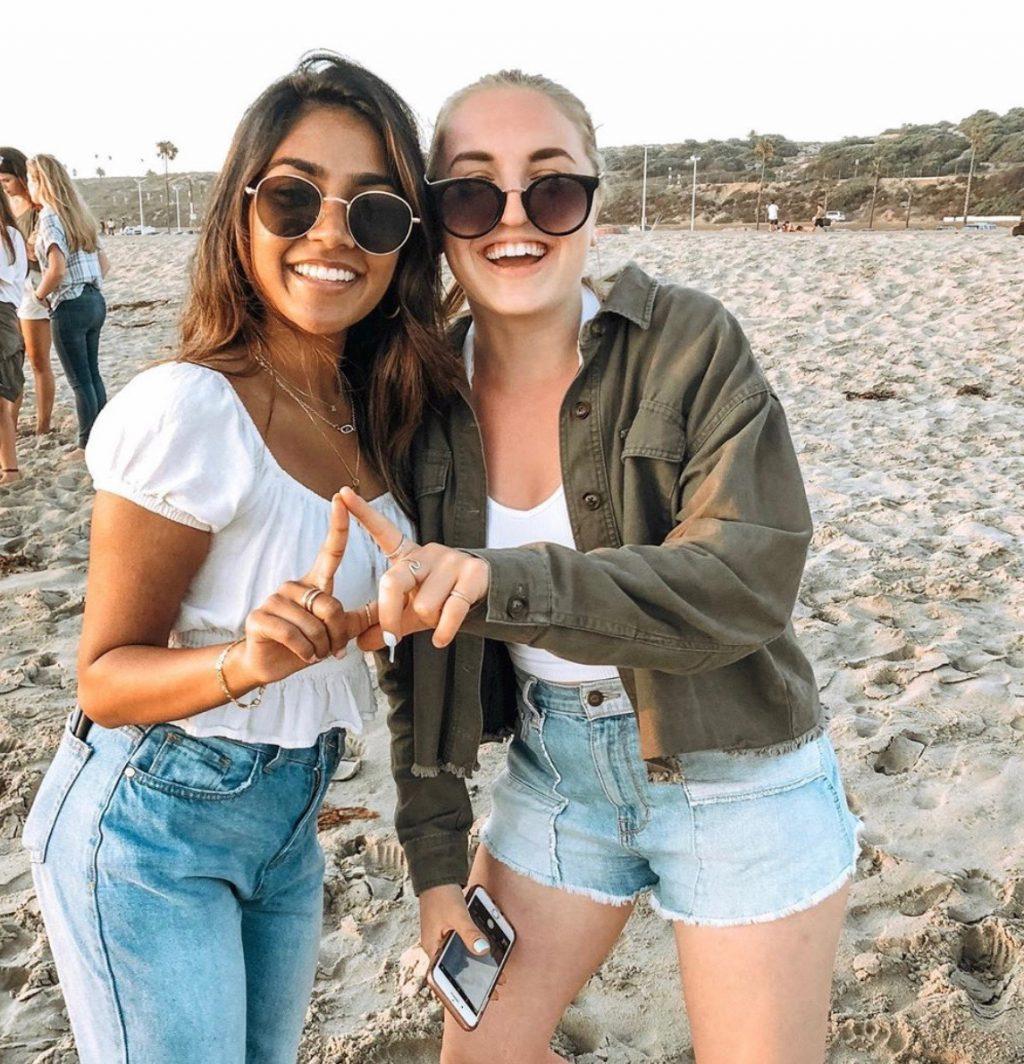 Ipe (left) and fellow Tri Delta member Allie Libman (right) enjoy the beach at their sorority bonding event in September 2019. Jennifer rushed Tri Delta in 2017 and has held leadership positions in her chapter.