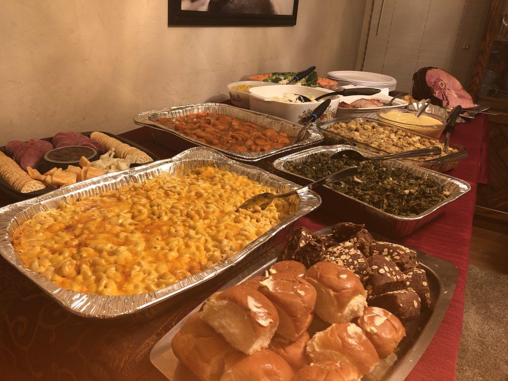 A Thanksgiving dinner featuring some of the prominent soul foods — macaroni and cheese, greens, yams, mashed potatoes, bread — which often contain excessive salt and contribute to some African Americans' existing health conditions. Photo by Brianna Willis.