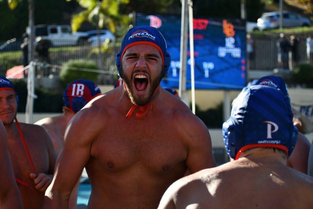 Senior water polo center Coleman Carpenter celebrates on the sideline after a Pepperdine goal versus Long Beach on Nov. 24, 2019. Carpenter and some of his teammates have been able to train periodically at an off-campus facility. Photo courtesy of Coleman Carpenter