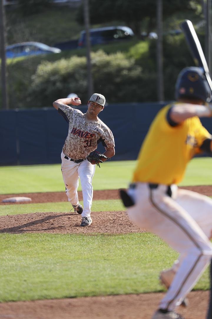 Right-handed pitcher Michael Mahony delivers a pitch in a game in Malibu. Photo courtesy of Pepperdine Athletics