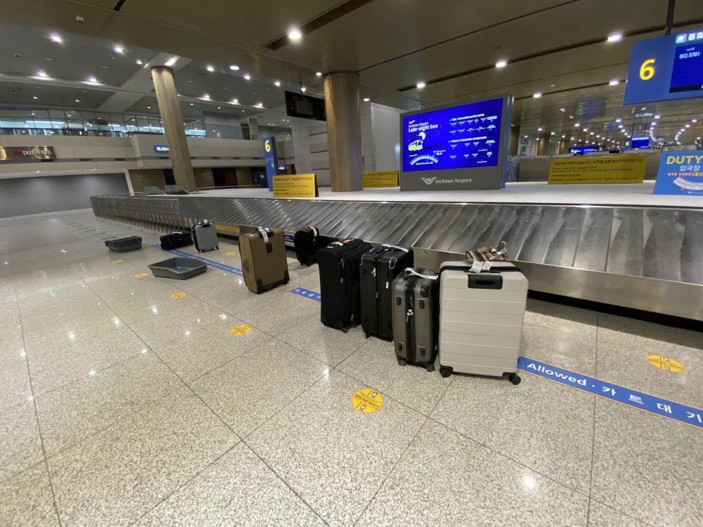 The leftover luggage from my flight remains at baggage claim. Nearly three hours had passed since I got off the plane, and I repeatedly checked each of these suitcases to confirm that none of them were mine.