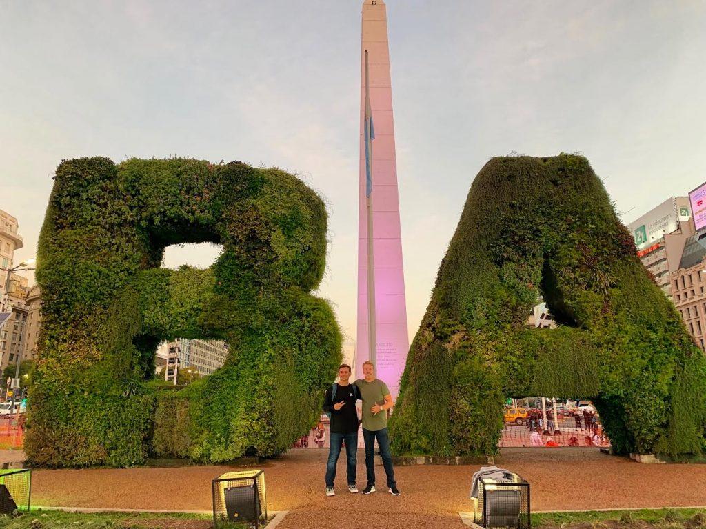 Ekenstam (left) and Olson (right) pose in front of the Obelisco in Buenos Aires, during their time abroad in September 2019. Ekenstam said he hopes the club can host a fundraiser for a local establishment the BA program supports to give back to that community. Photo courtesy of Nick Olson