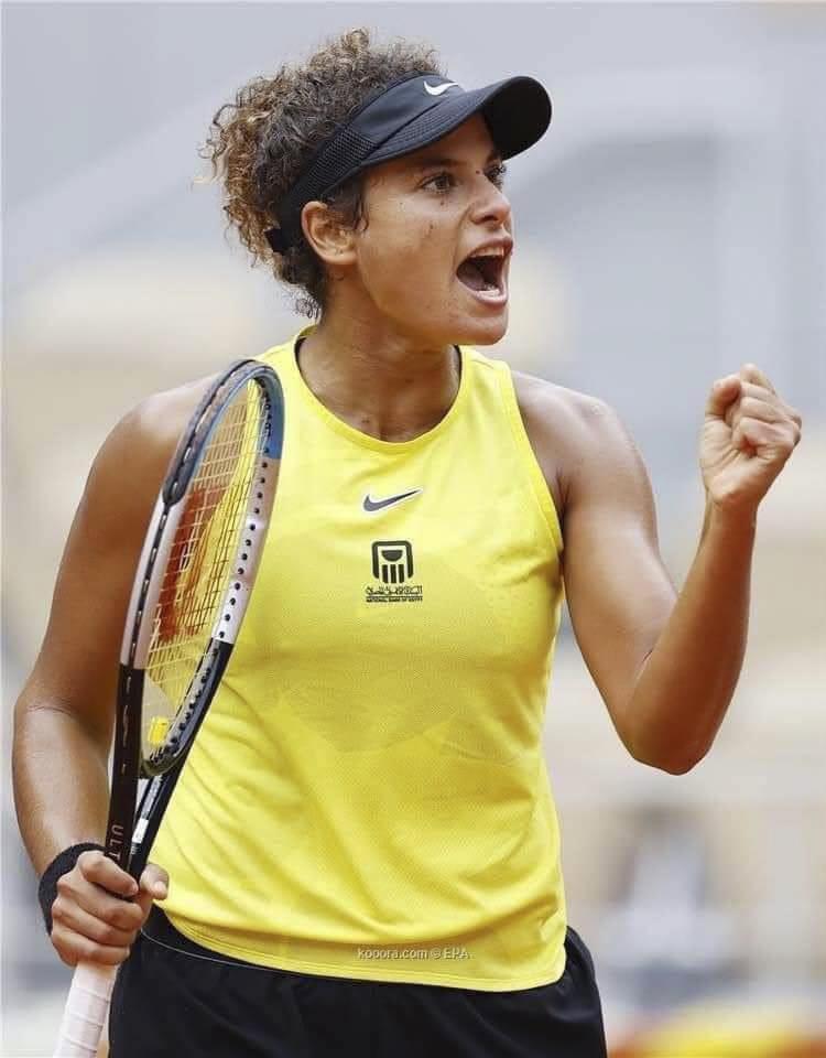 Sherif looks toward her coaches box and celebrates during her French Open match against Karolina Pliskova in September. Pliskova's high ranking enabled Sherif to play in a 15,000-seat stadium and for a worldwide television audience.