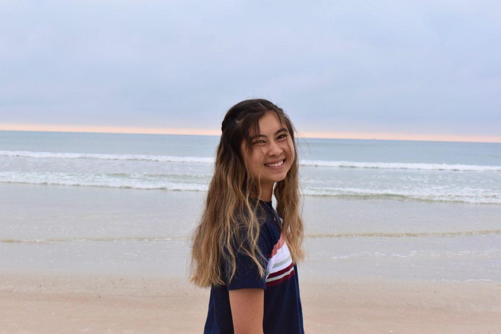 Screen Arts major Maddi Winter smiles at a Florida beach in March. Winter said she frequently incorporates animation and dance in her TikToks. Photo courtesy of Maddi Winter