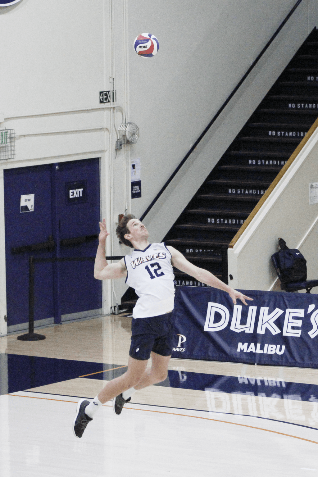 Redshirt sophomore Jacob Steele bows back for a jump serve against the Antelopes during Sunday's match. Steele logged two aces during this match.