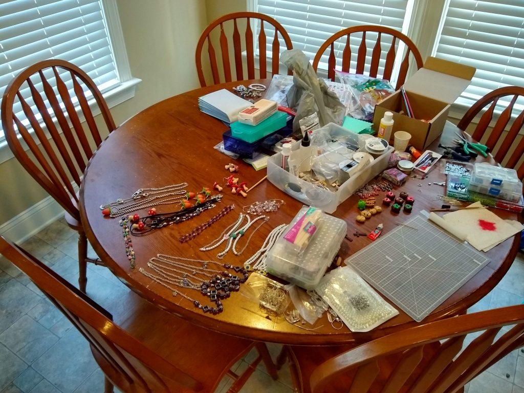 Hardwick's jewelry making supplies take up most of the space on her kitchen table in her home.  Hardwick said she makes and packs all of her jewelry orders here.