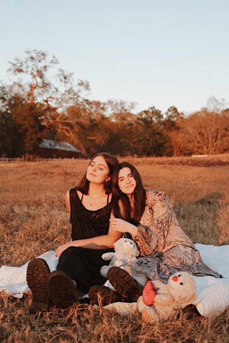 Davis and Sullivan sit on a blanket outside of Davis' home in Nacogdoches, Texas, in December. Sullivan said the possibility of recording in a studio is one of the reasons she came to Malibu, Calif., this semester. Photo courtesy of Lindsey Sullivan