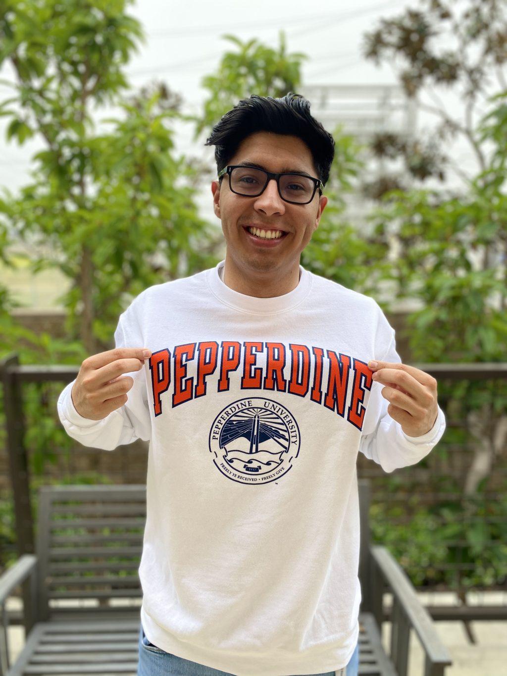 Barragán poses for a photo after getting into Pepperdine in Hawthorne in May. He said his admissions counselor, Eddie Mejia, who is of Hispanic Latino descent, was able to speak to him on many levels and was a big part of why he committed to Pepperdine.