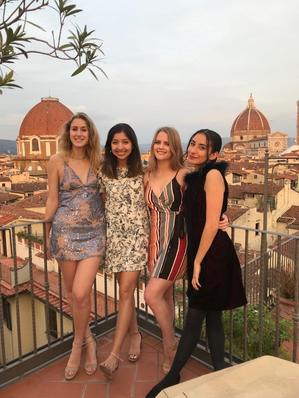 Campbell (far right) poses for a photo during her final banquet in Florence, Italy in April 2019 with seniors Allie Skupin (far left), Daniela Singleterry (middle) and Grace Heflin (middle). All the program participants attended this banquet at a hotel on the last night before everyone flew home.