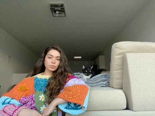 Auli'i Cravalho, Moana's voice actress, poses for a photo in the sweater Ross made her.  Cravalho posted the photo on Twitter in January, which generated a lot of buzz around Ross' business.  Photo courtesy of Auli'i Cravalho