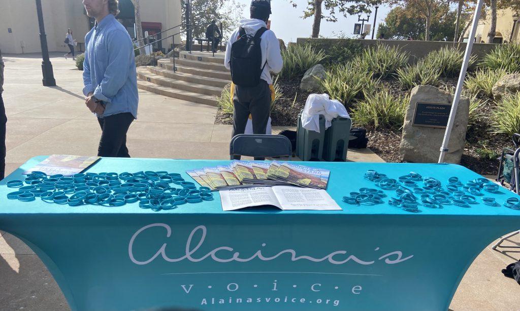 The Alaina's Voice table sits on Joslyn Plaza for Hope Forward Day. Pepperdine hosted the event to honor Alaina Housley, a first-year student who died at the Borderline shooting three years ago. Photo by Abby Wilt