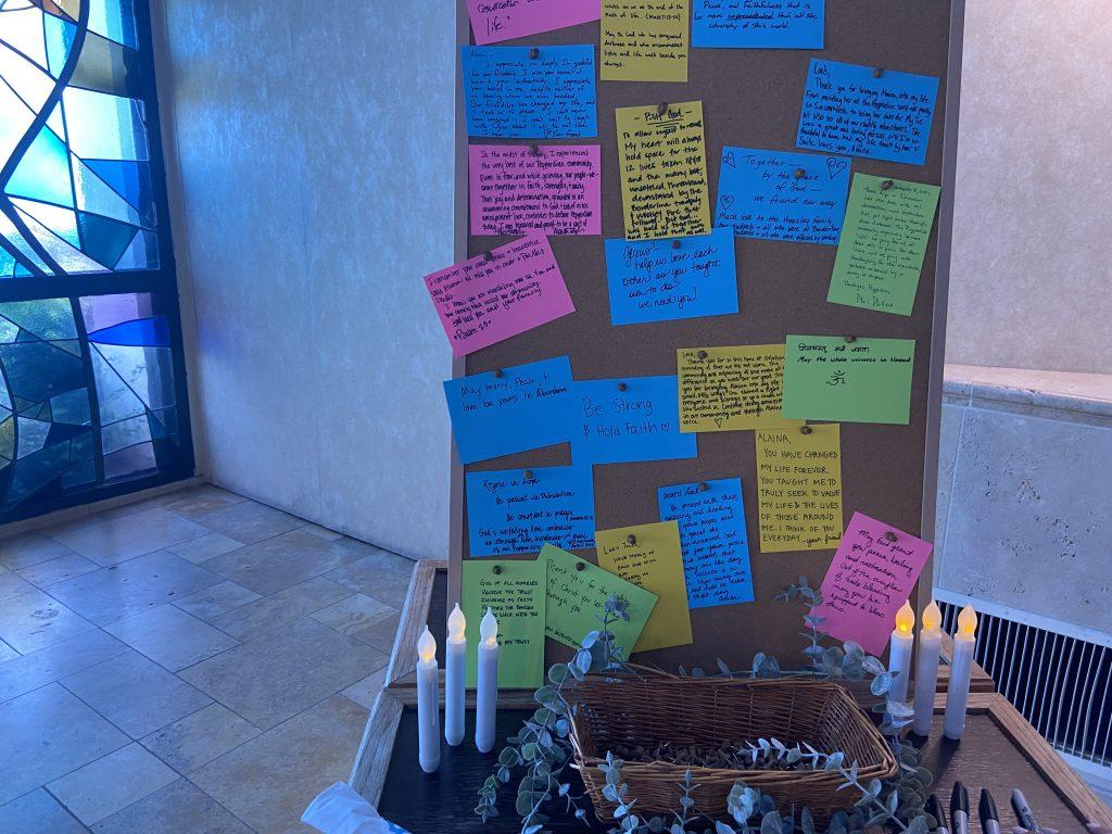 A bulletin board sits at the front of Stauffer Chapel with prayers and words of encouragement about the Borderline shooting and Woolsey Fire. The time of reflection was one of three events Pepperdine hosted to remember the third anniversary. Photo by Abby Wilt