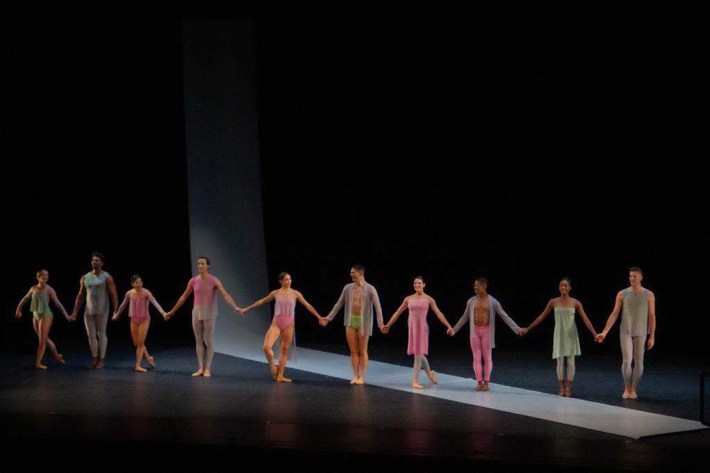 The BalletX dancers bow as the audience applauds and cheers. Yorita said the ability to create an emotional connection with the audience inspires her.