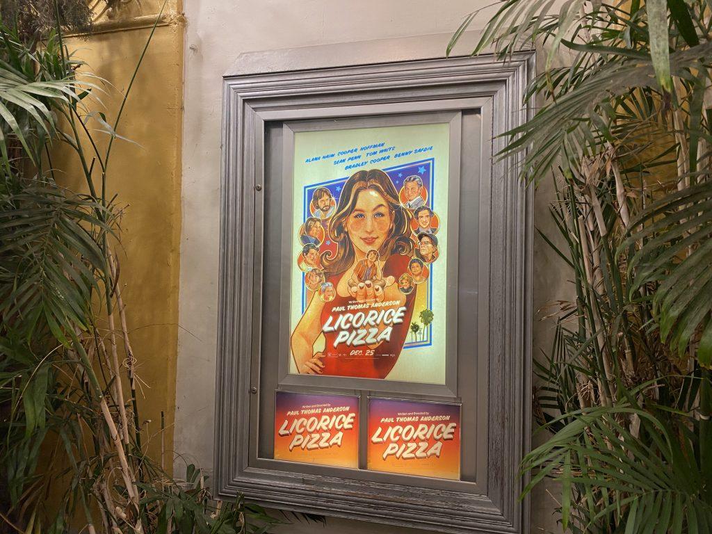 The alternative "Licorice Pizza" poster stands tall at the early screening of the film at the Regency Theater in Westwood, Calif., on Nov. 18. This film followed Paul Thomas Anderson&squot;s 2017 film "Phantom Thread." Photo by Beth Gonzales