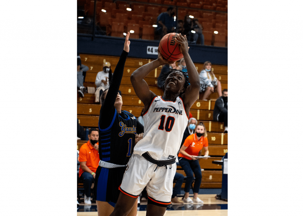 Sophomore forward Jane Nwaba goes up for a tightly contested shot versus UC Santa Barbara. Nwaba contributed with 10 points off the bench.