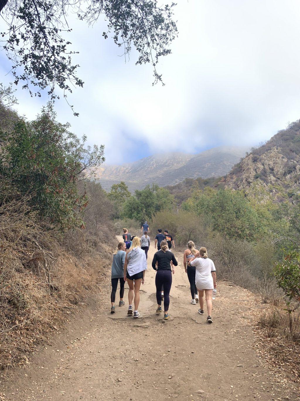 Students walk together on the Solstice Canyon trail for the Seaver 200 Faith and Hiking group fall semester. The group gathered for weekly hikes to talk about their faith. Photo courtesy of Falon Barton