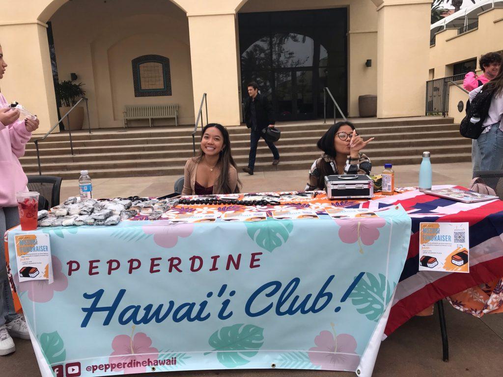 Shim and Kylie Girl Guieb from the Pepperdine Hawai'i Club hold a fundraising event in front of Elkins Auditorium. She said she is passionate about making the club an inclusive place for all students. Photo courtesy of Hana Shim