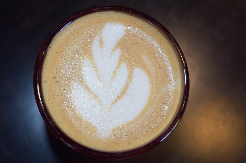Rosetta latte art embellishes the classic oak milk vanilla latte. The lattes from Saloon were decorated with varying forms of latte art.