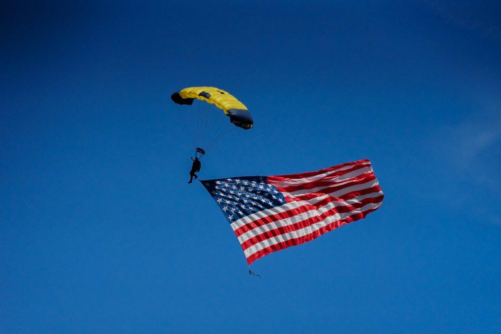 Members of the Navy Leap Frog team parachuted into Tari Frahm Rokus Field during the playing of the national anthem Feb. 12. The Leap Frogs included a Pepperdine alumnus, Lieutenant Matt Carter, as well.