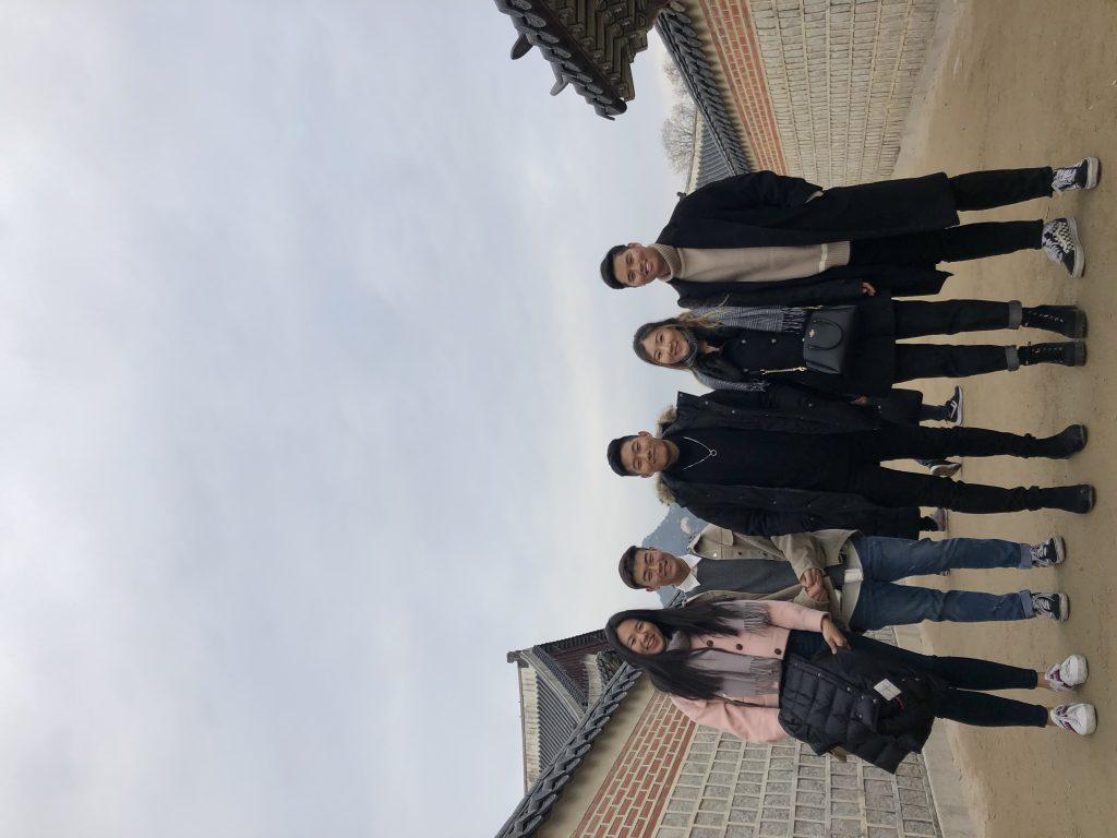 Yoon poses with her friends in South Korea. Yoon said visiting South Korea for the first time allowed her to connect with her roots.
