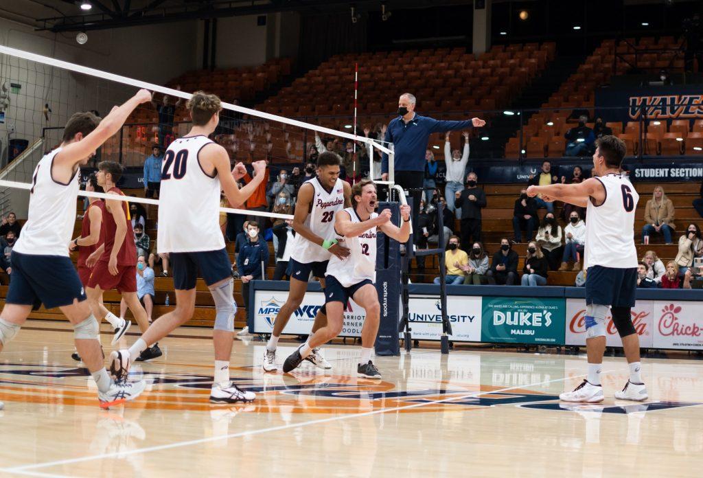 Pepperdine Men's Volleyball team celebrates after scoring a point versus USC on Feb. 23. As a team, the Waves finished the game with 56 kills on a .288 clip.