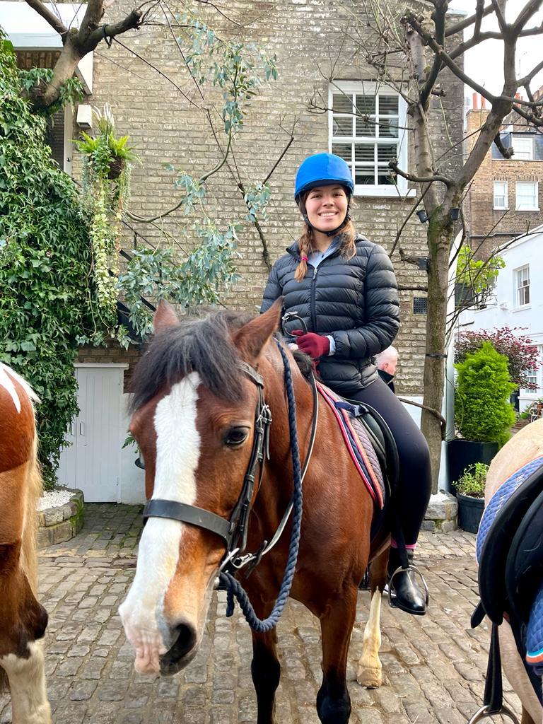 Junior Sarah Hunt is all smiles as she heads off for her second lesson in mid-January at the Hyde Park stables in London with around five other students. Hunt said she learned English style riding versus the Western riding style practiced in the United States. Photo courtesy of Sarah Hunt