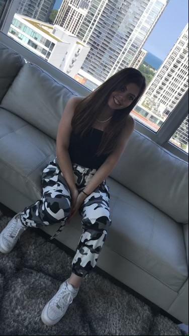Autumn smiles in Chicago in July 2019, the summer before her first year at Pepperdine. Gary Tennison said Autumn was visiting Chicago for a Khalid concert and stayed in an AirBnB on the lakeshore, feeling special. Photo courtesy of Gary Tennison