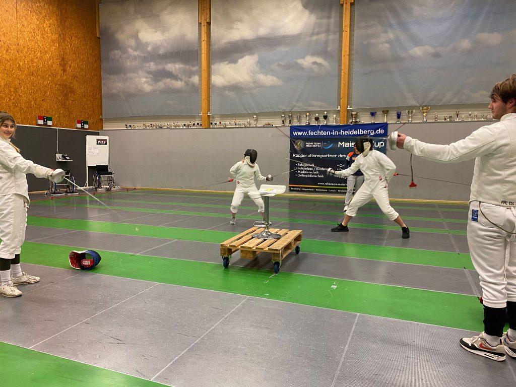 Sophomore Phillip Young and friends battle in a fencing tournament on Dec. 6 in Heidelberg. Young said he participates in many activities and has hiked "Philosopher&squot;s Way" in Germany. Photo courtesy of Phillip Young