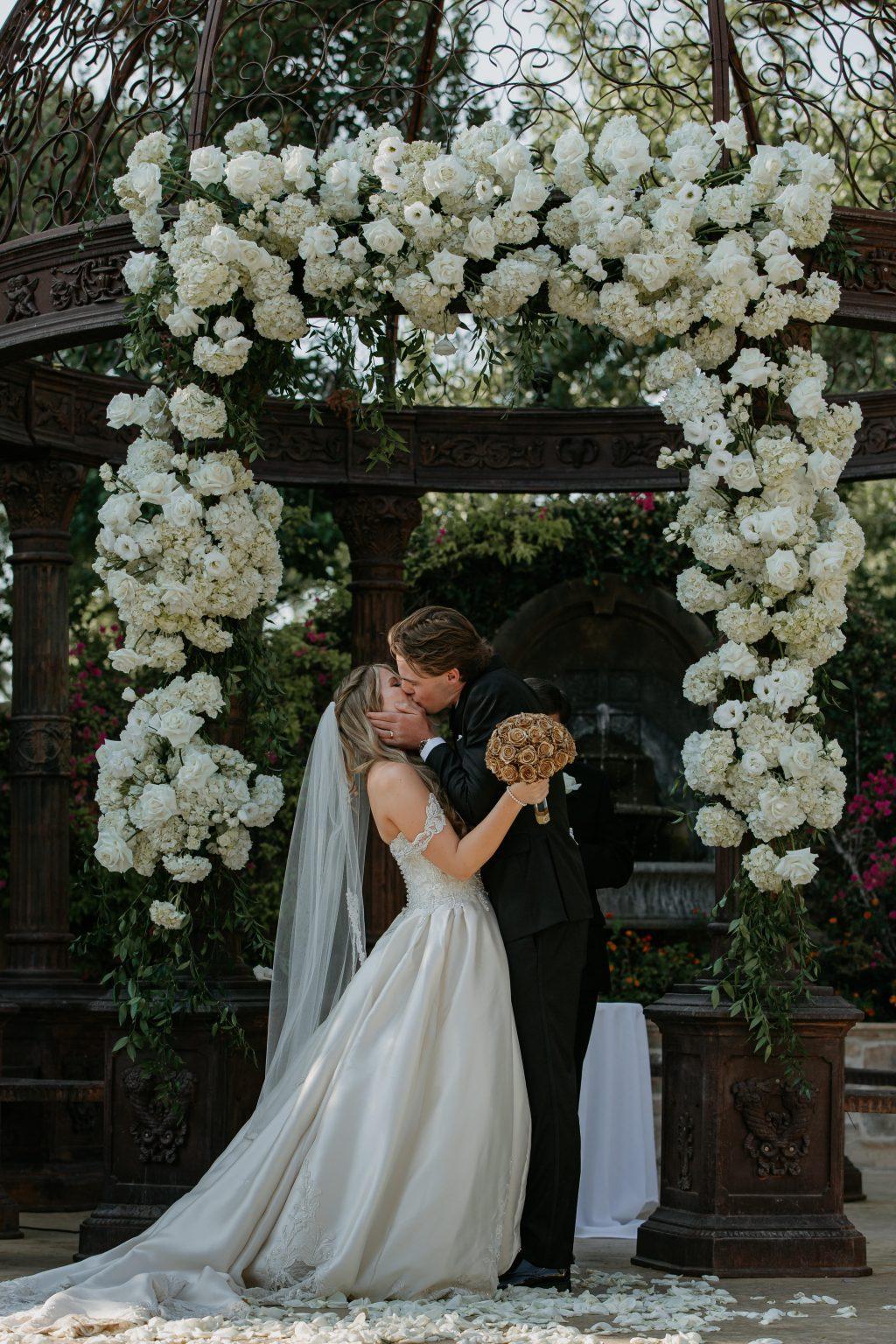 Maya and Hunter kiss for the first time as a married couple. They got married in Westlake Village, Calif., in July 2021.