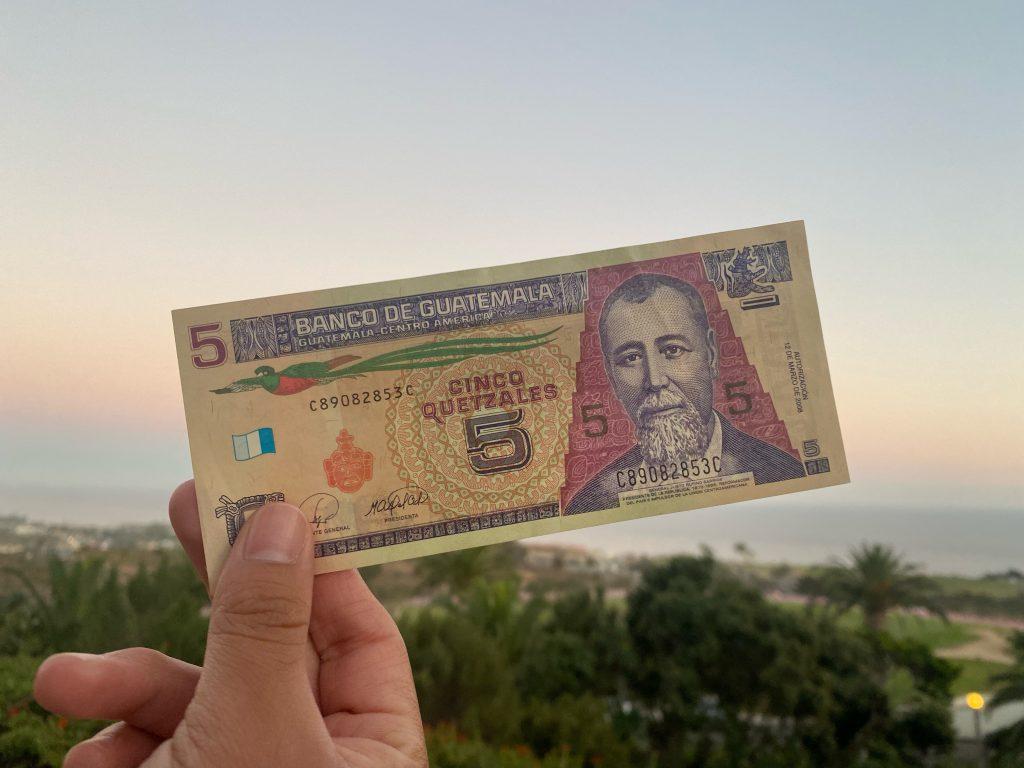 Diana Flores holding money from Guatemala. Flores said she last visited Guatemala with her family when she was 12. Photo courtesy of Diana Flores