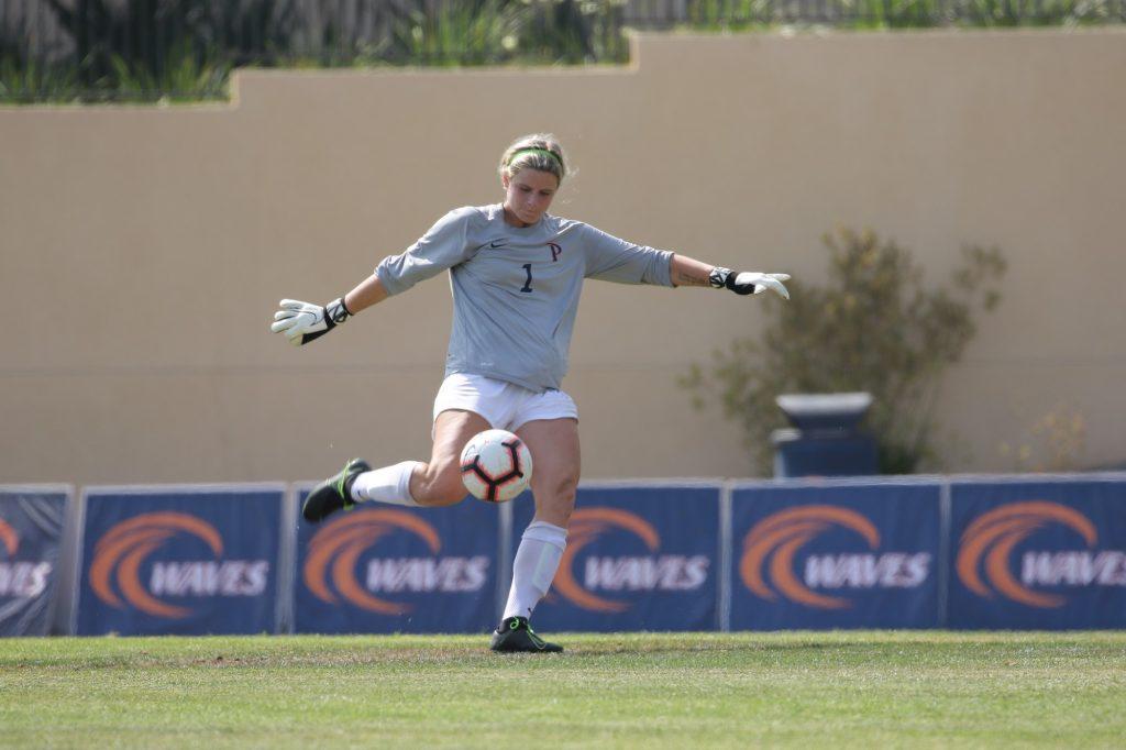 Redshirt junior goalkeeper Zoe Clevely bumps the ball with her knee in a victory game over UC Riverside on Aug. 22, 2019. In her first year starting, Clevely went down with an injury during the fourth game of the season versus Vanderbilt but is expected to return to her starting spot.