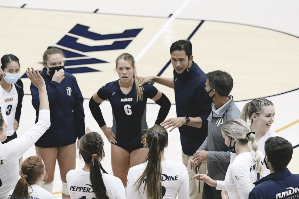 Head Coach Scott Wong speaks to his team during a match Feb. 23, against BYU. In his sixth season at the helm, Wong led the Waves to their second NCAA Tournament appearance in three seasons.