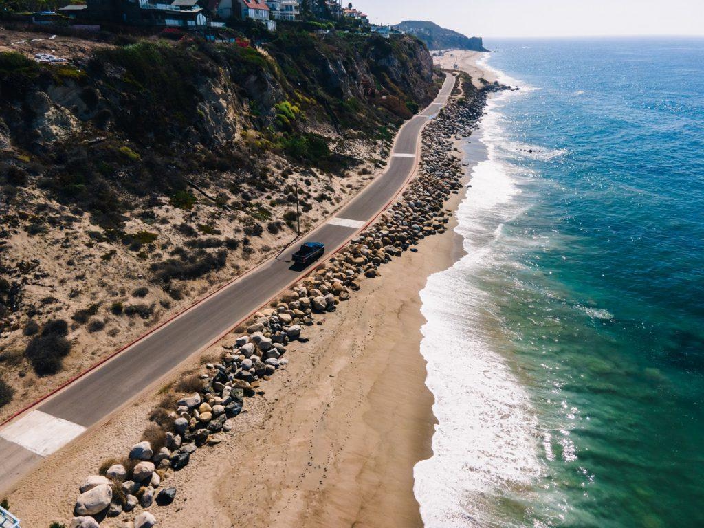 The waves encroach on the road between Westward Beach and Point Dume in October. Costal erosion is threatening the road, as the ocean wears away on the sand in front of it, said Karen Lynn Martin, distinguished professor emeritus of Biology. Photos by Lucian Himes