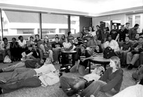 48 Hrs: Students gather in the Sandbar Monday to watch President George W. Bush deliver his ultimatum to Saddam Hussein. Photo/Lindsey Baguio