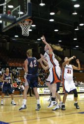 Girls play basketball