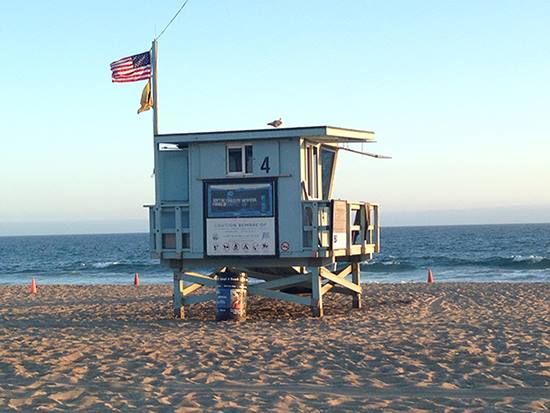 ZUMA BEACH, CALIFORNIA, USA - Lifeguard watching swimmers on Zuma
