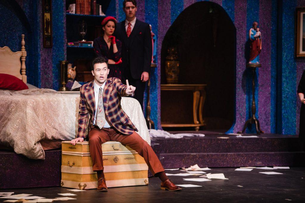 Trickster Gianni Schicchi (Jack Gerding) outlines his plan to change the will of a family's deceased relative. The fast-paced Italian comedy is the second of two one-act performances that constitute this year's opera.