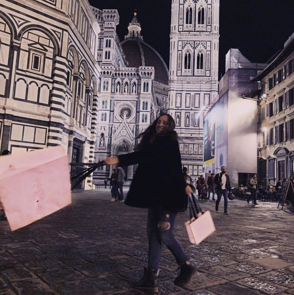 Sophomore Emily Lucente swings shopping bags around at Piazza Del Duomo in Florence, Italy. Photo courtesy of Emily Lucente