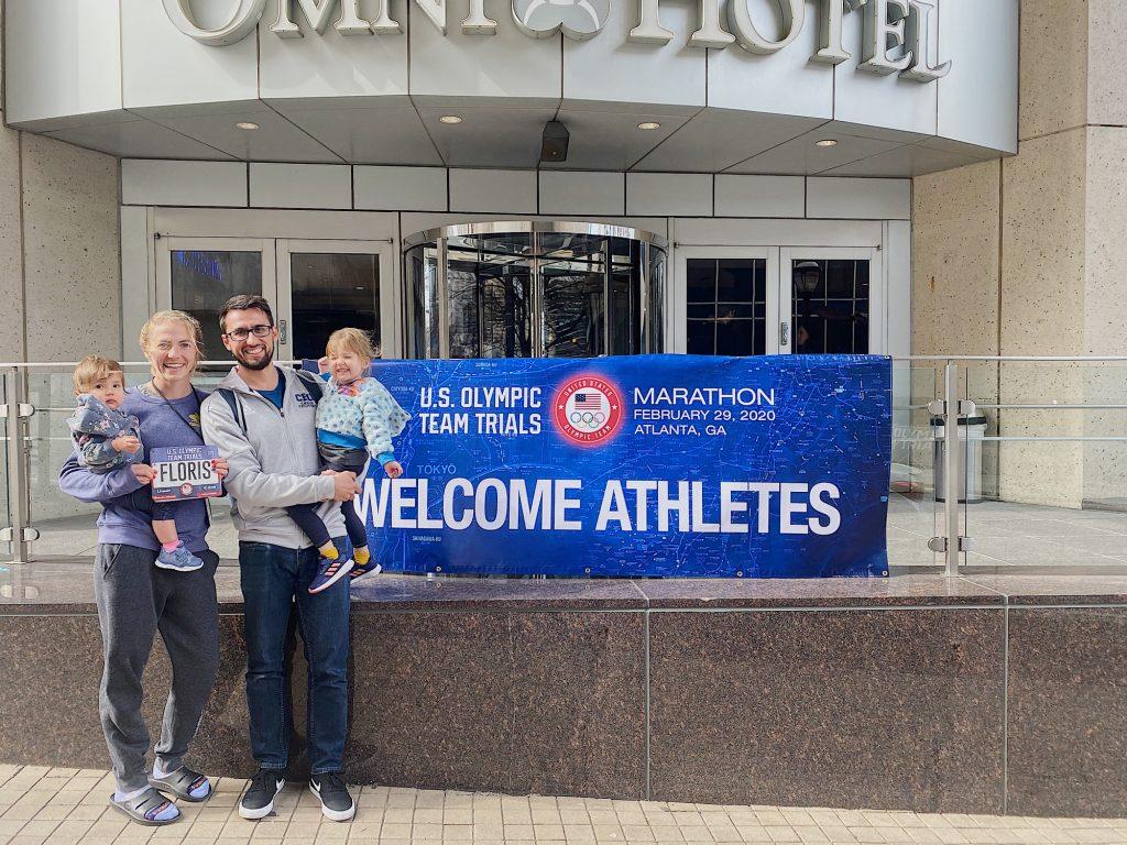 The Floris family poses in front of the athlete hotel in Atlanta.
