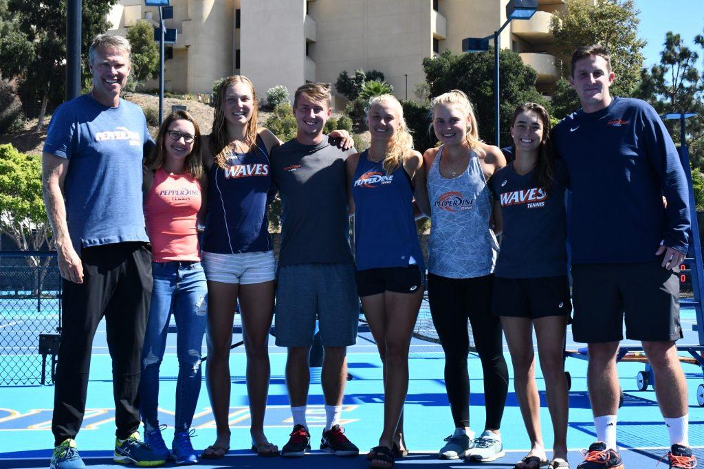 Ashley Lahey poses with her teammates and coaches at the Ralphs-Straus Tennis Center in October 2019 after winning the Women's Collegiate Invitational, her second of three individual titles during the fall season. Lahey defeated fifth-year teammate Jessica Failla in the tournament's singles final. Photo courtesy of Pepperdine Athletics