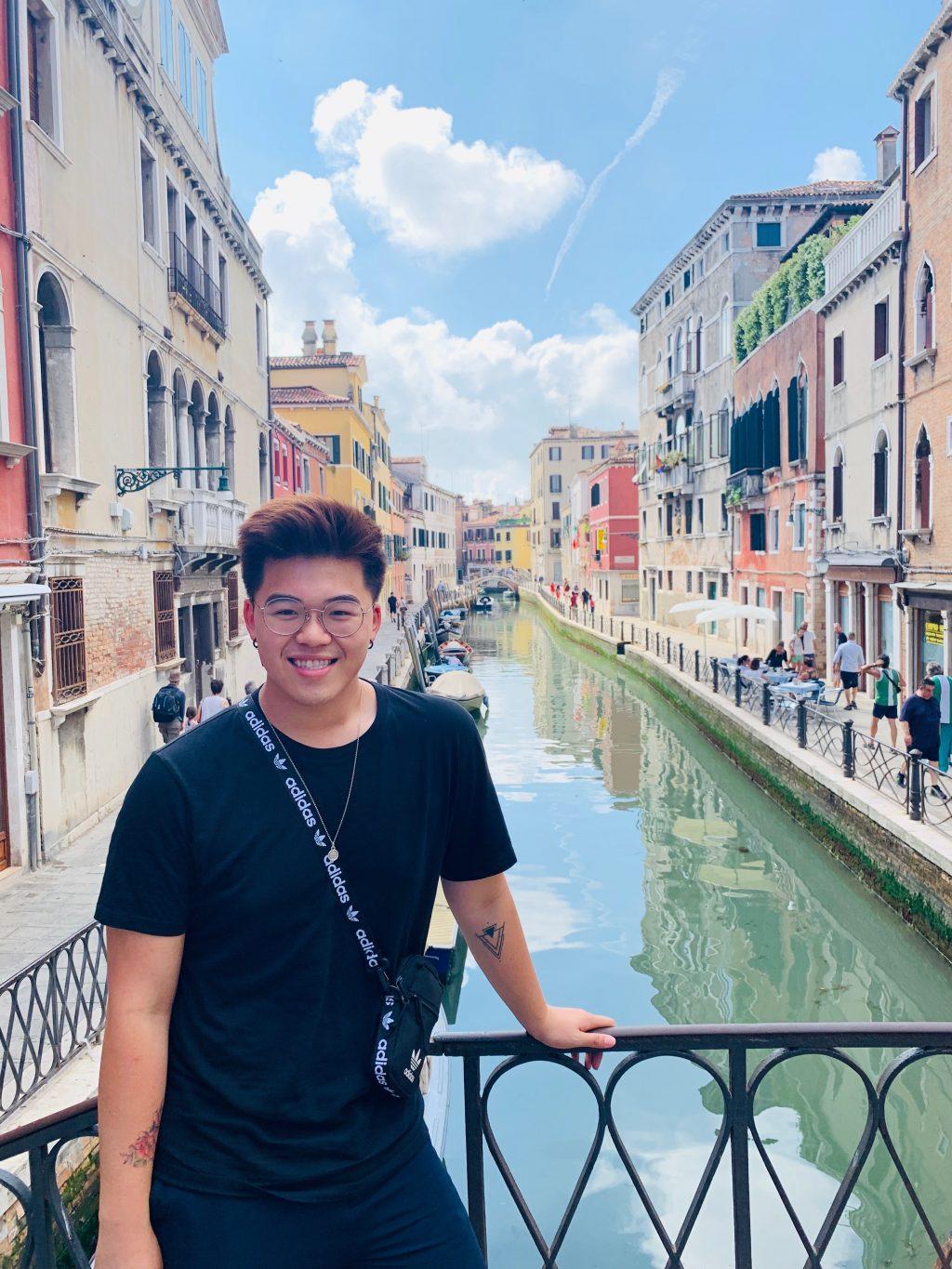 Alhambra, California resident Derek Wu stands next to a canal in Venice, Italy during his study program with the University of California Riverside. Although he lives in a predominantly Asian community, Wu said he feels self-conscious of his race and ethnicity when he goes go to places where Asian Americans might not frequent. Photo courtesy of Derek Wu.