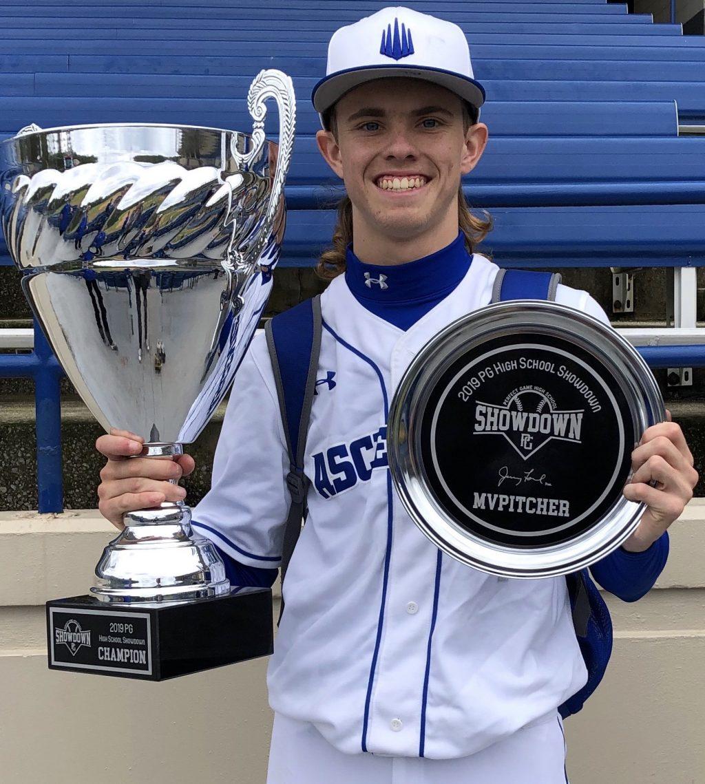 Llewellyn holds his team's 2019 national championship trophy and his MVP award for the best pitching performance of the tournament. Llewellyn has been a member of the prestigious IMG Academy national baseball team for the past two years.