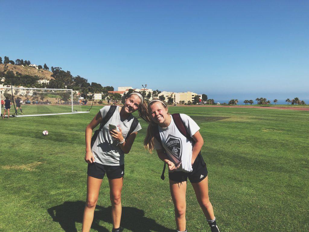 Freshman goalkeeper Ellie Sommers (right) poses with a fellow recruit during a visit to Pepperdine. Sommers has not been able to return to campus since committing and remains home in Colorado. Photo courtesy of Ellie Sommers