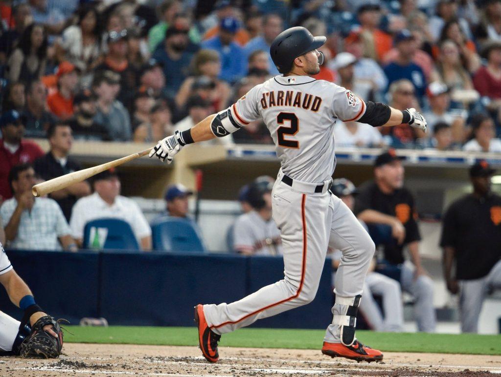 Utility infielder Chase d'Arnaud bats at a game when he was playing for the San Francisco Giants. One of d'Arnaud's fondest big league memories came when he pitched a scoreless for the Giants in 2018.