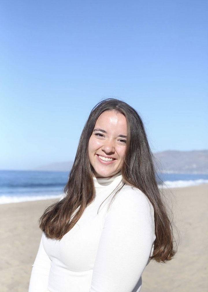 Senior Caitlin Fogg beams while standing on Westward Beach last year. Fogg interned virtually as a sales and trading summer analyst with Citibank last summer in Chicago, Ill., and currently serves as an operations intern remotely at Schumetta, Inc., in Malibu. Photo courtesy of Caitlin Fogg