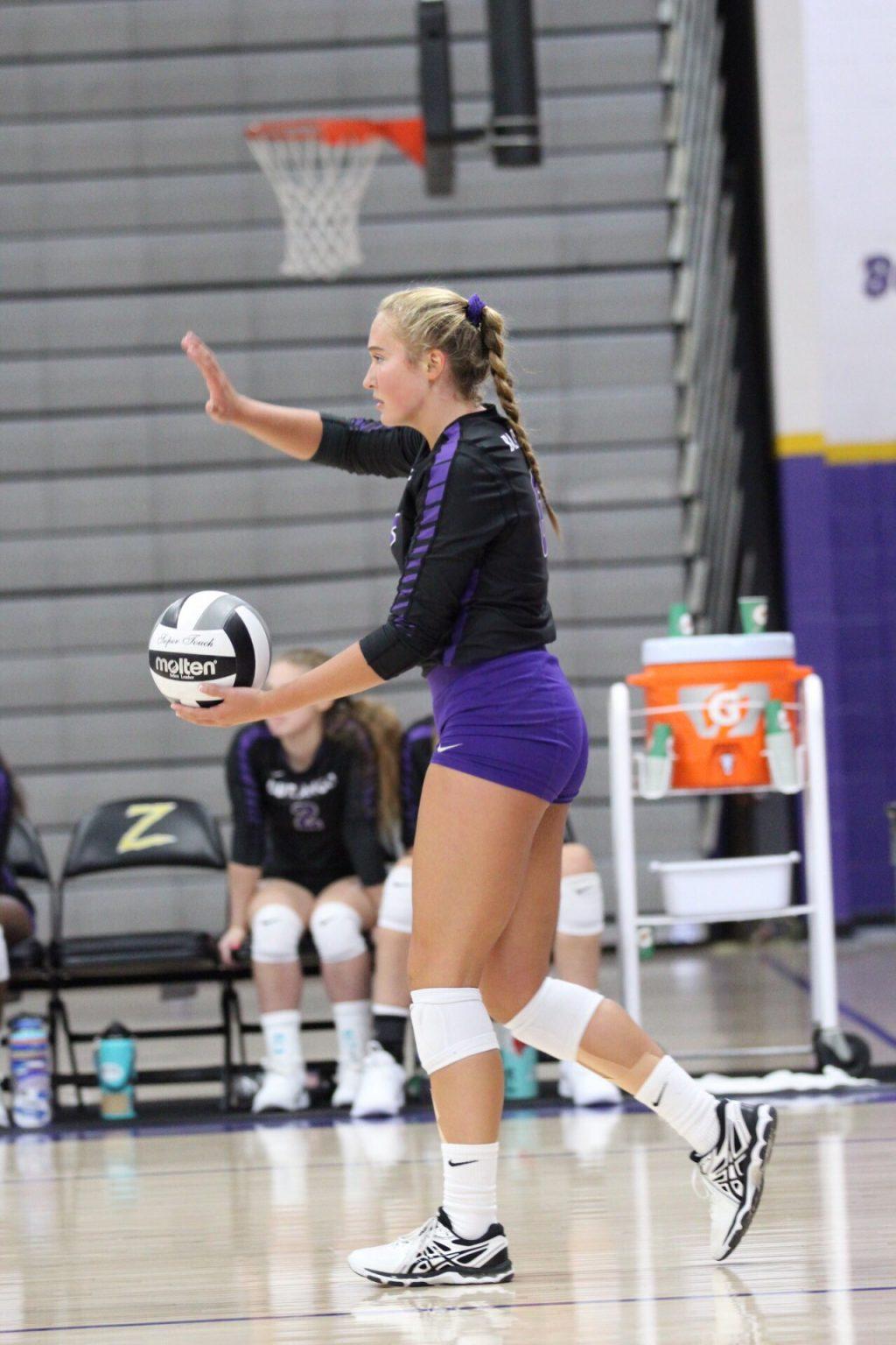 Steele prepares to serve in a game in the fall of 2019. Steele played in the defensive specialist and outside hitter positions during her high school career in Henderson, Nevada. Photo courtesy of Kennedi Steele