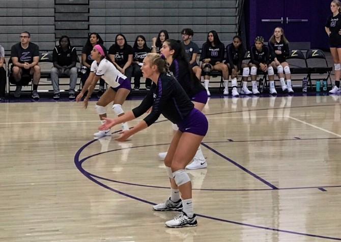 Defensive specialist Kennedi Steele prepares to receive a serve in a match from her senior year in the fall of 2019. Steele planned to play volleyball this fall but is one of many freshmen student-athletes studying from home this semester. Photo courtesy of Kennedi Steele