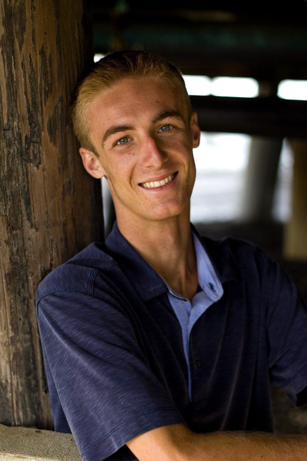 Senior Britain Hope poses for a close-up for the theater production. Hope portrayed Jaquan's partner Tom, who battles against addiction and for underserved communities.