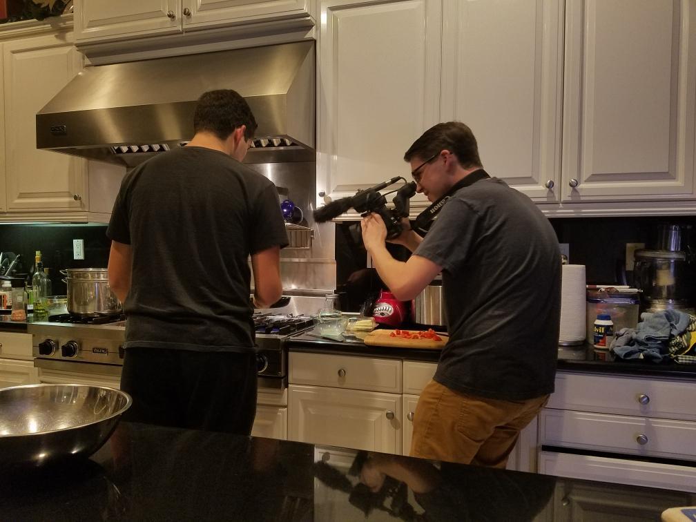 Emrich films his friend cooking for his "The Perfect Omelette" project in the summer of 2019. Emrich said combining his music-related passions starts his filmmaking process.