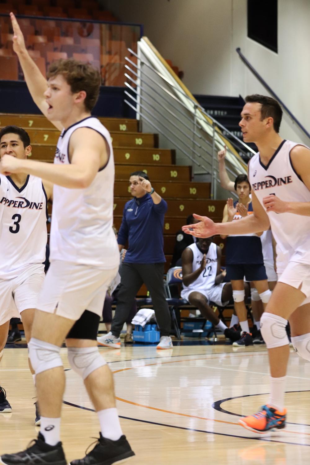 Head Coach David Hunt coaches from the sideline during a match against CUI in Firestone Fieldhouse on Feb. 12. While at Pepperdine, Hunt tallied a 46–21 record as the Waves' head coach. Photo by Ali Levens